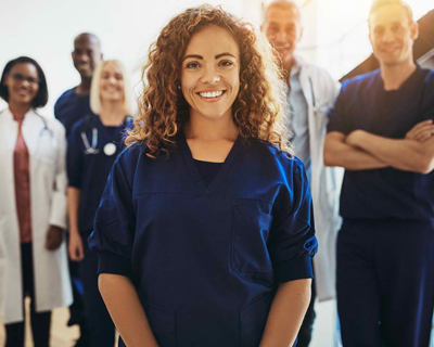 a group of medical staff smiling