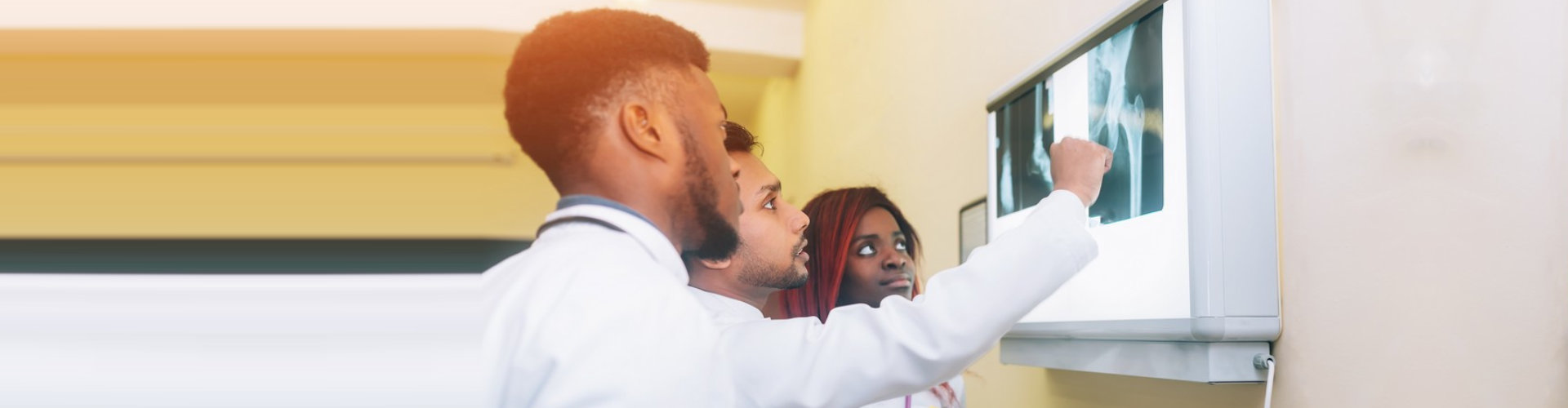 medical staff looking on a screen