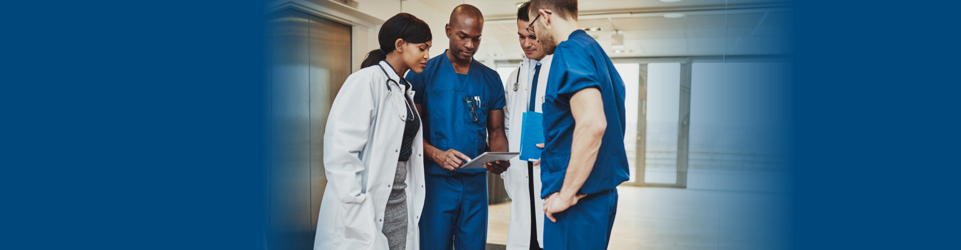 medical staff looking on the tablet